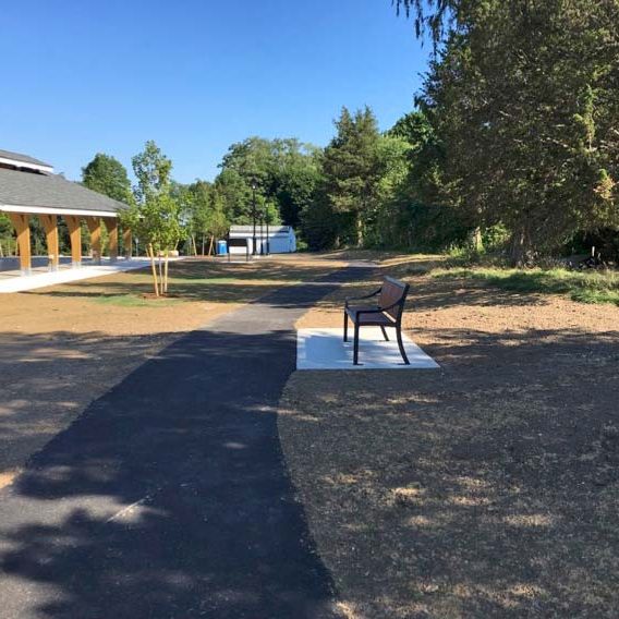 Paved park with bench